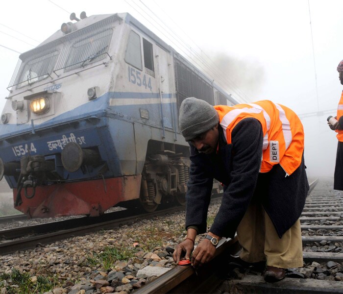 The fog has caused Rs 10 crore loss to northern Railways during the first five days of this year alone because of repeated trains cancellations.(AP Photo)