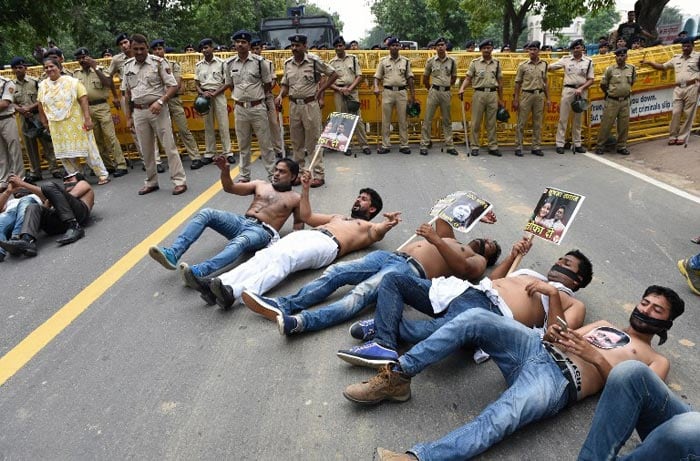 5 Pics: Angry and Shirtless, Congress Workers Protest Against BJP