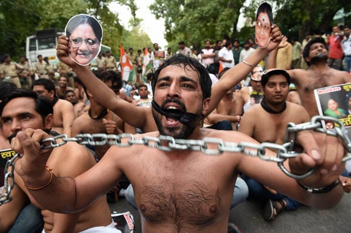 5 Pics: Angry and Shirtless, Congress Workers Protest Against BJP