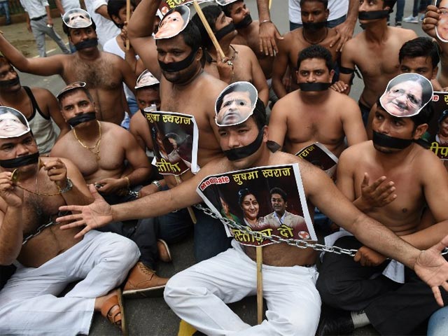 5 Pics: Angry and Shirtless, Congress Workers Protest Against BJP