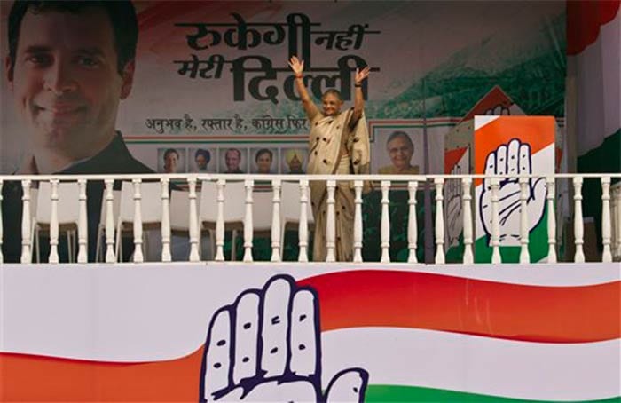 Delhi Chief Minister Sheila Dikshit waves to supporters at a Congress rally in New Delhi on October 27, 2013.