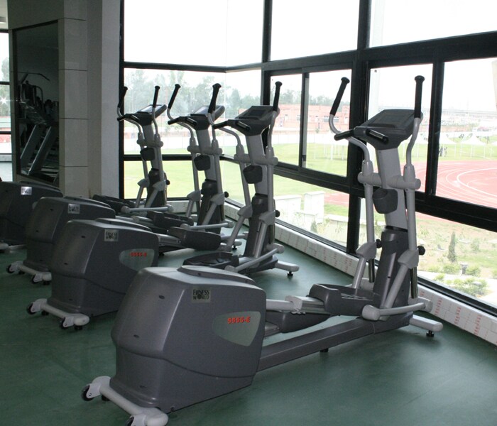 The gym with a view of the village running track.