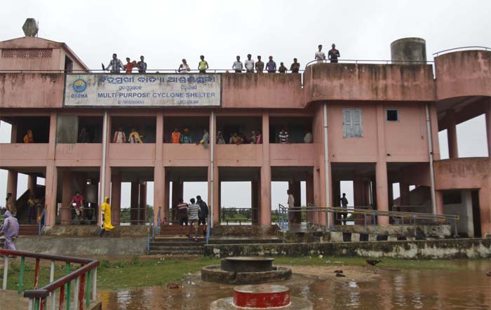 Villagers take refuge in a cyclone shelter at Gokhorkuda village in Ganjam district about 200 kilometers from Bhubaneswar, Odisha.