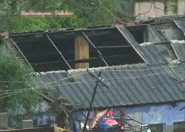 It rained in coastal areas of Odisha and Andhra Pradesh through the day yesterday and power supply was cut from Ichchapuram to Palasa in Andhra Pradesh and in seven coastal districts in Odisha. Seen here, a roof damaged during the storm in Behrampur.