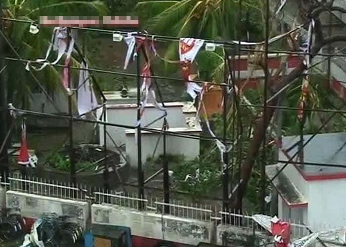 All 56 trains on the Howrah-Visakhapatnam route were cancelled and about 16 trains were diverted. Road traffic is also likely to be hit by the heavy rain. Odisha's airport in capital Bhubaneswar was closed yesterday. Seen here, a billboard damaged during the storm.