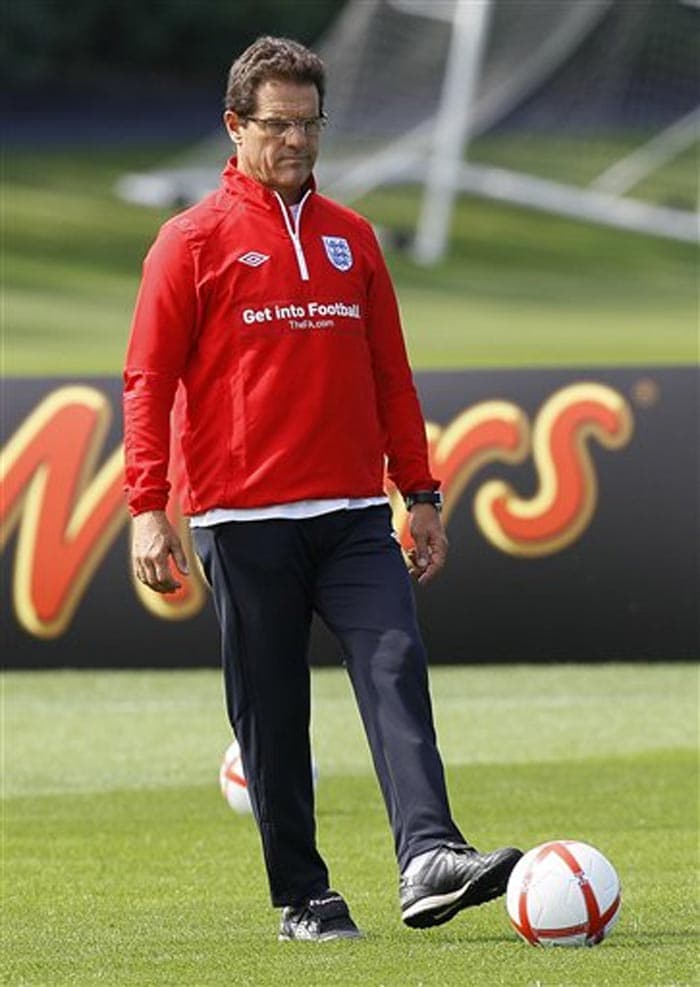 England coach Fabio Capello said on Wednesday that the 35-year-old former captain is too old and will no longer be a part of his plans as he prepares for the 2012 European Championship qualifying campaign.<br><br> ?David is a fantastic player, he was really important, but we have to see the new players for the future because the age is important for a lot of people, not only for David. I hope he can play one more friendly game to say bye bye.? Capello said. <br><br>?Did I phone him before I went on television? No. I think I will speak with him. We tried to speak with him. But I think David knows he has no future with the international team because we have to change. We tried to speak with him.'' Capello further stated. (AP Photo)