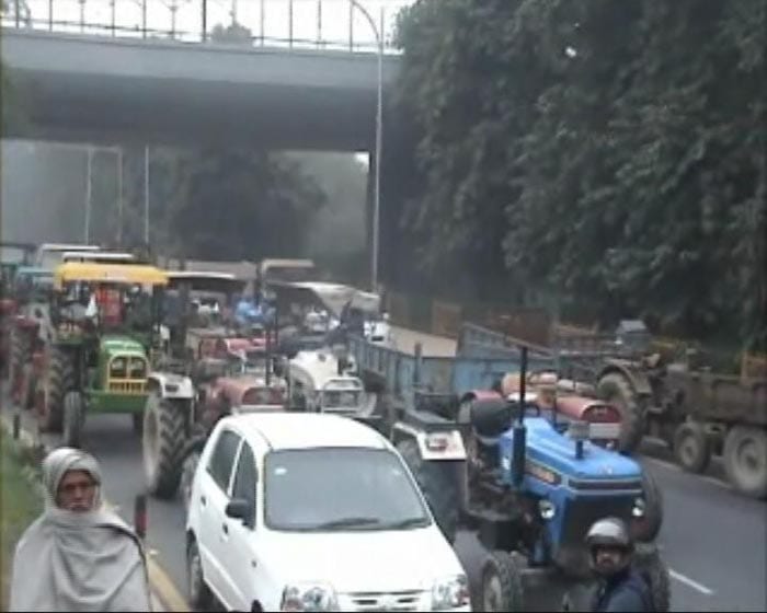 Commuters had to face a harrowing time today when protesting farmers blocked an entry point to Noida near Delhi, throwing traffic out of gear.