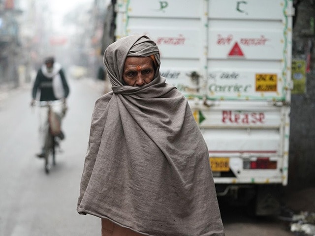 Photo : दिल्ली में रिकॉर्ड तोड़ ठंड, पारा 3 डिग्री तक लुढ़का