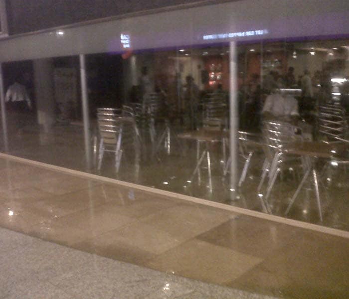 The impact of rain was such that water flowed in front of an eatery inside the hospital forcing it to be shut down.  A popular eatery joint had to be closed after its roof caved in.
<br><br><a href="http://gen.ndtv.com/convergence/ndtv/new/forums/readforum.aspx?trdid=3489">Delhi waterlogged after rain: Were you affected?</a>