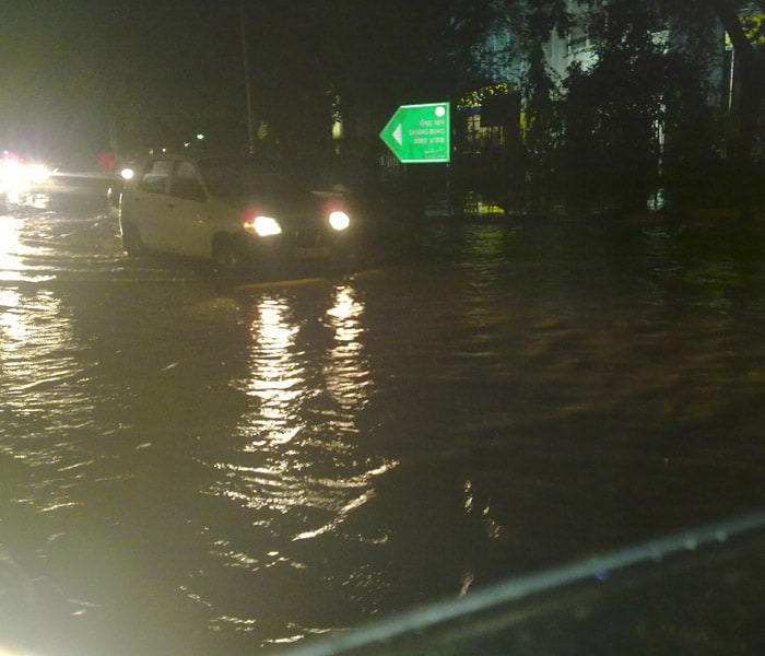 The maximum temperature plunged by a couple of notches following heavy rain. But the humidity was on the higher side, crossing over 90 per cent. In this picture, a water-logged Parliament Street. (Sent by NDTV Active surfer)<br><br>
<a href="http://gen.ndtv.com/convergence/ndtv/new/forums/readforum.aspx?trdid=3489">Delhi waterlogged after rain: Were you affected?</a>