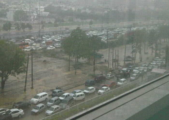 The photo shows a waterlogged road in Delhi. The incessant rain led to long traffic jams in the city. Picture courtesy Rajasrkhan.
<br><br><a href="http://gen.ndtv.com/convergence/ndtv/new/forums/readforum.aspx?trdid=3489">Delhi waterlogged after rain: Were you affected?</a>