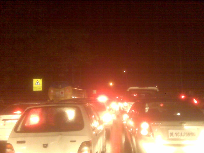 This picture was taken on the road in front of the Prime Minister's house at 7, Race Course Road to the Ashoka hotel. Distance of 3 km took 1 hour.
<br><br>
There were not enough traffic policemen on the roads.
<br><br><a href="http://gen.ndtv.com/convergence/ndtv/new/forums/readforum.aspx?trdid=3489">Delhi waterlogged after rain: Were you affected?</a>