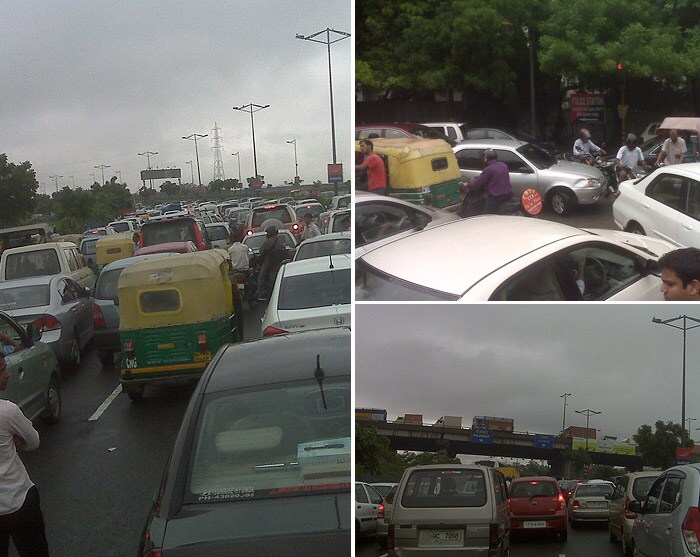 Commuters complained that motorcyclists had blocked the road to protect themselves from rain right at the start of the DND flyover from Ashram resulting in huge traffic jams. (Photo: Kunwar Sankalp Singh)<br><br><b>Be an I-Witness</b><br><br>You too can share your story through photos and videos. Just upload them here and we'll feature the best entries on Ndtv.com.<br><br><iframe  src="http://www.ndtv.com/convergence/ndtv/new/iframe_NDTVShowUpload.aspx?Template=iwitness&ReqEmail=1&ShowCity=1&ReqCity=1&type=a&ShowDisclaimer=0"  width="400" height="200"  scrolling="no" frameborder="0"> </iframe>