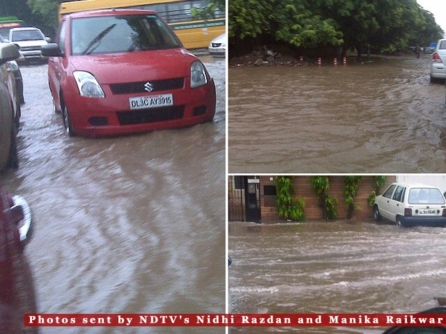 Flooding on the Delhi roads after the heavy rains on Thursday morning threw normal life out of gear. These pictures from Greater Kailash Part 1 and outside Kamala Nehru College in South Delhi. (Surfer pic)<br><br><b>Be an I-Witness</b><br><br>You too can share your story through photos and videos. Just upload them here and we'll feature the best entries on Ndtv.com.<br><br><iframe  src="http://www.ndtv.com/convergence/ndtv/new/iframe_NDTVShowUpload.aspx?Template=iwitness&ReqEmail=1&ShowCity=1&ReqCity=1&type=a&ShowDisclaimer=0"  width="400" height="200"  scrolling="no" frameborder="0"> </iframe>