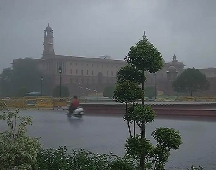 Traffic jams are expected as rain continues to lash Delhi during morning rush hour.