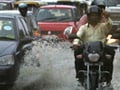 Photo : Rain, traffic snarls stop Delhi