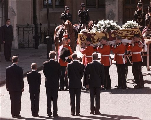 The Family Mourns: Prince Charles, Prince Harry, Earl Charles Spencer, Prince William and Prince Philip stand as the coffin bearing the body of Princess Diana is taken into Westminster Abbey, London.