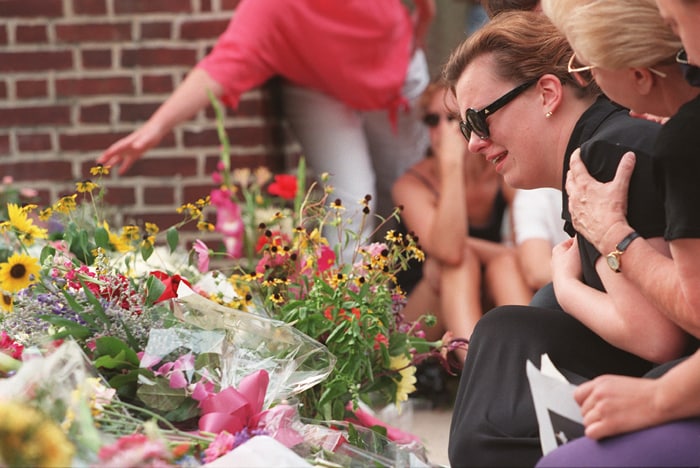 A scar too deep: A woman mourns the death of Diana, in front of the British Embassy in Washington, DC, 31 August. The untimely death of Diana passed a wave of shock through the British populace.