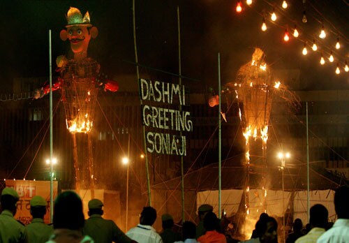 <b>Celebrations:</b> The effigies of demon king Ravana and his brother Kumbhkaran burn during the 'Dussehra celebrations' at Ramlila Maidan in New Delhi. (PTI)