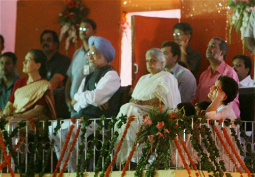 <b>Royal show:</b> Prime Minister Manmohan Singh, UPA Chairperson Sonia Gandhi, Delhi CM Sheila Dikshit and Priyanka Vadra watch the burning effigy of demon king Ravana, during the 'Dussehra celebrations' at Ramlila Maidan in New Delhi. (PTI)