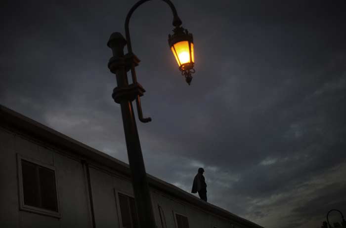 An Egyptian soldier stands guard on the roof of Parliament in Cairo on Thursday. (AFP Photo)