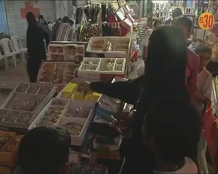 People of all ages crowded markets across the country where colourful Eid stalls had been set up offering special clothes and sweets.