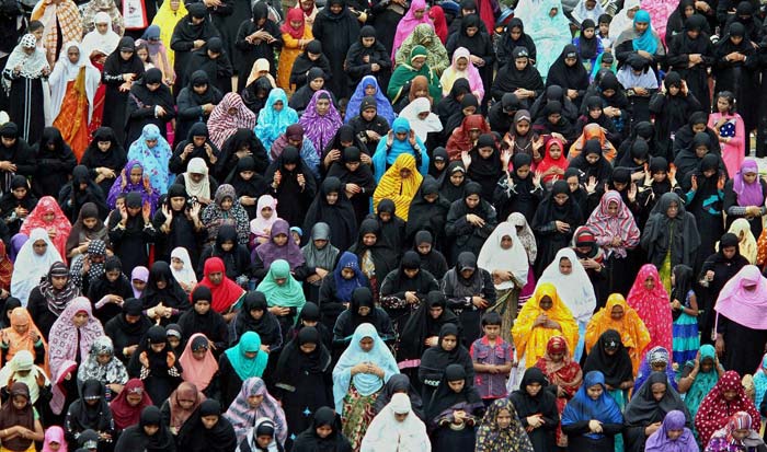 Women devotees in Chennai pray on the occasion of Eid.