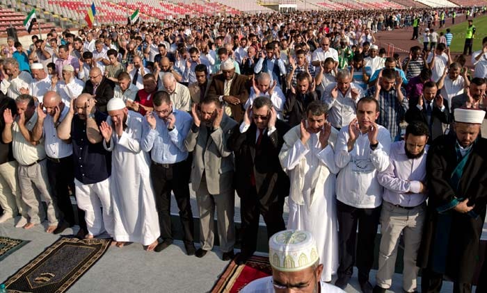 Muslims take part in Eid al-Fitr prayers in Bucharest, Romania.