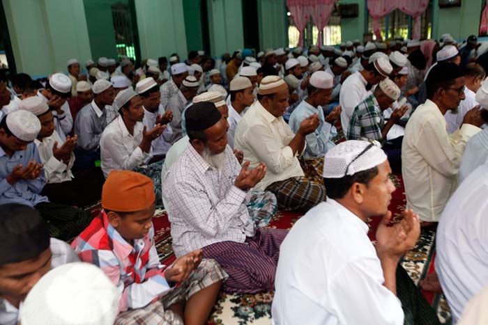 Myanmar Muslims pray at a mosque during the festival of Eid al-Fitr on the outskirts of Yangon.