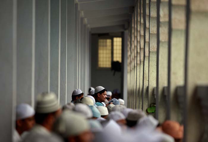 Nepalese Muslims offer prayers on Eid al-Fitr in Katmandu, Nepal.