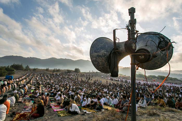 Indonesian Muslims attend Eid al-Fitr morning prayer that marks the end of the holy fasting month of Ramadan on Parangkusumo beach in Yogyakarta.