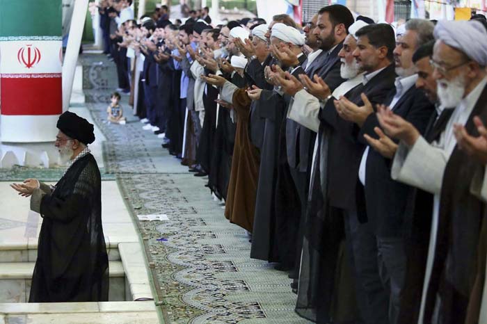 Iranian Supreme Leader Ayatollah Ali Khamenei, Khamenei, leads Eid prayers at the Tehran University campus.