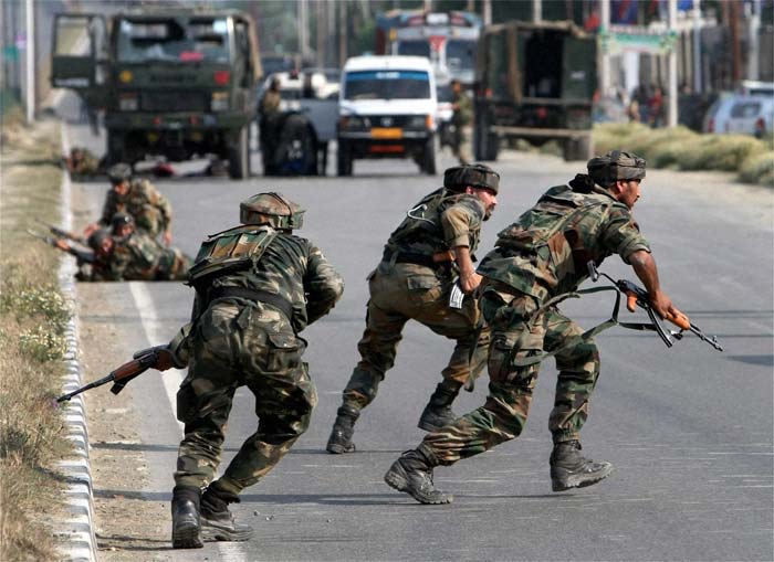 A day before Prime Minister Manmohan Singh begins a visit to Jammu and Kashmir, suspected militants today opened fire on an Army convoy near Bemina on the outskirts of Srinagar.