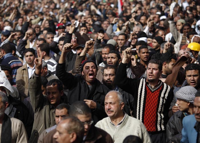 Anti-government protester shouts slogans during a demonstration at the Tahrir Square. (AP Photo)