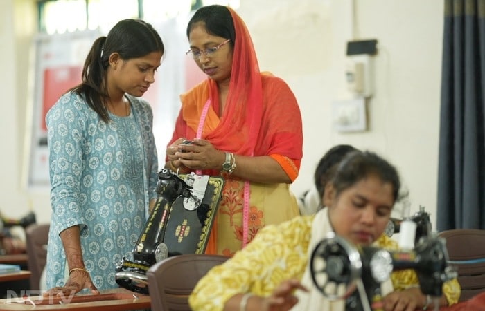 From Bhojpur's constraints - married at 17, dreams stifled-Yashira Anjum seized a 2019 Usha Silai School chance. Returning with skills and a machine, she drew crowds, training over 5,000 women through NGOs like Save the Children, earning ?30,000-35,000 monthly as a governance voice.