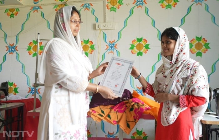 Her joy? Watching learners stand tall, proving one courageous stitch ripples into thousands finding their voice.