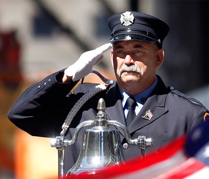 Moments of silence were held at 8:46 am, 9:03 am, 9:59 am and 10:28 am to mark the times the hijacked jetliners hit the north and south towers of the World Trade Centre, as well as the times they collapsed. (AP)