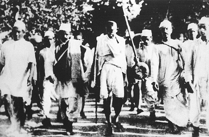 In this picture taken on March 1930, Gandhi is pictured with his followers during the famous salt march to Dandi in the western Indian state of Gujarat.<br><br> (Photo: AFP)