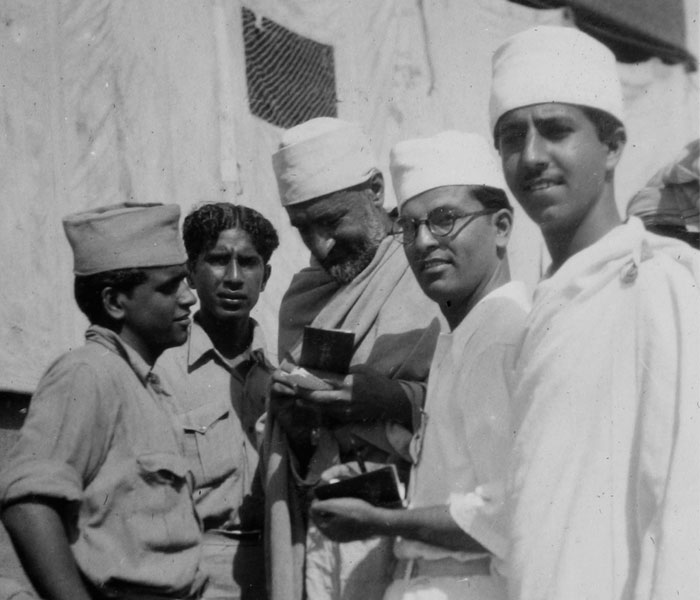 Mahatma Gandhi with his followers before a meeting.<br><br>(Photo: AP)