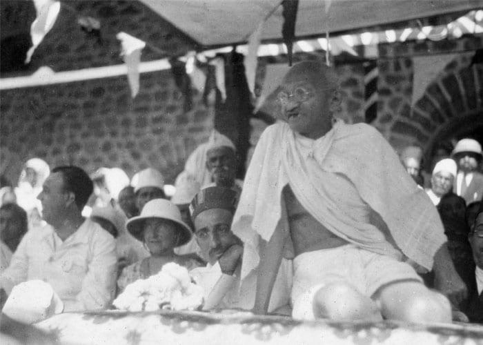 The Mahatma delivering a sermon to his followers. <br><br>(Photo: AP)