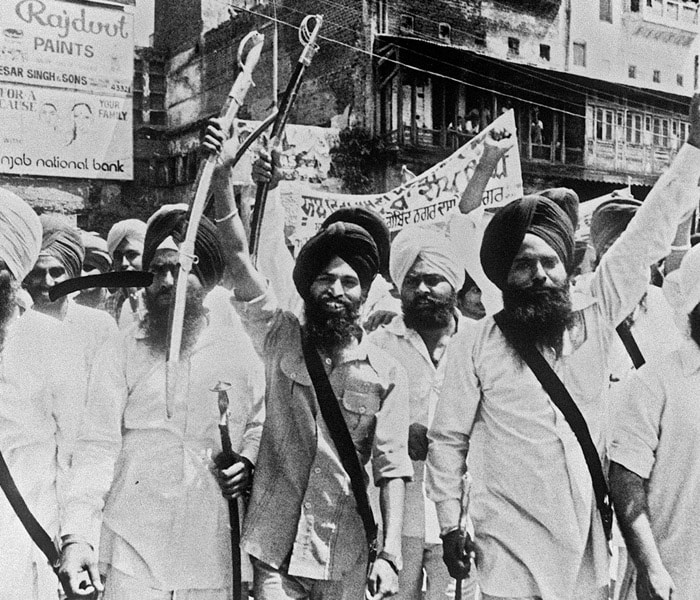 <p>Under Gandhi's order, the Indian army forcefully entered the Golden Temple in Amritsar to arrest insurgents, resulting in many Sikh deaths. (AFP Photo)