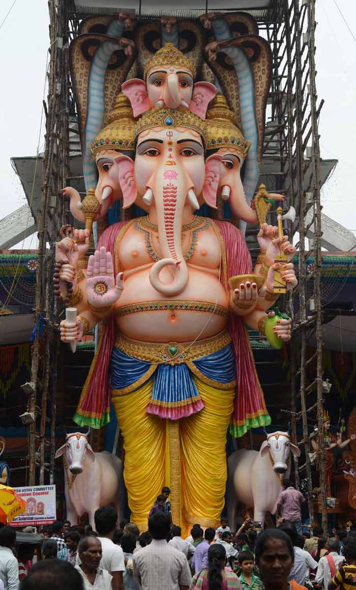 Devotees gather in front of a 17-meter tall idol of lord Ganesh in Hyderabad.