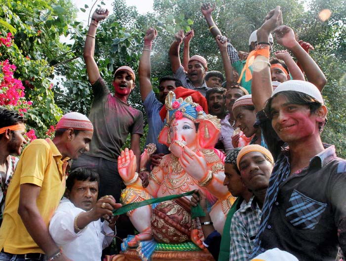 Muslims take part in Ganesh procession during Ganeshotsav in Ahmedabad.