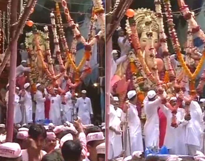 One of the largest idols, the Ganesh Gully's Lord Ganesh, began its slow journey to Girgaum Chowpatty for the final immersion, around five kilometres away. (NDTV Photo)<br><br><b>Be an I-Witness</b><br><br>You too can share your story through photos and videos. Just upload them here and we'll feature the best entries on NDTV.com.<br><br><iframe  src="http://www.ndtv.com/convergence/ndtv/new/iframe_NDTVShowUpload.aspx?Template=iwitness&ReqEmail=1&ShowCity=1&ReqCity=1&type=a&ShowDisclaimer=0"  width="400" height="200"  scrolling="no" frameborder="0"> </iframe>