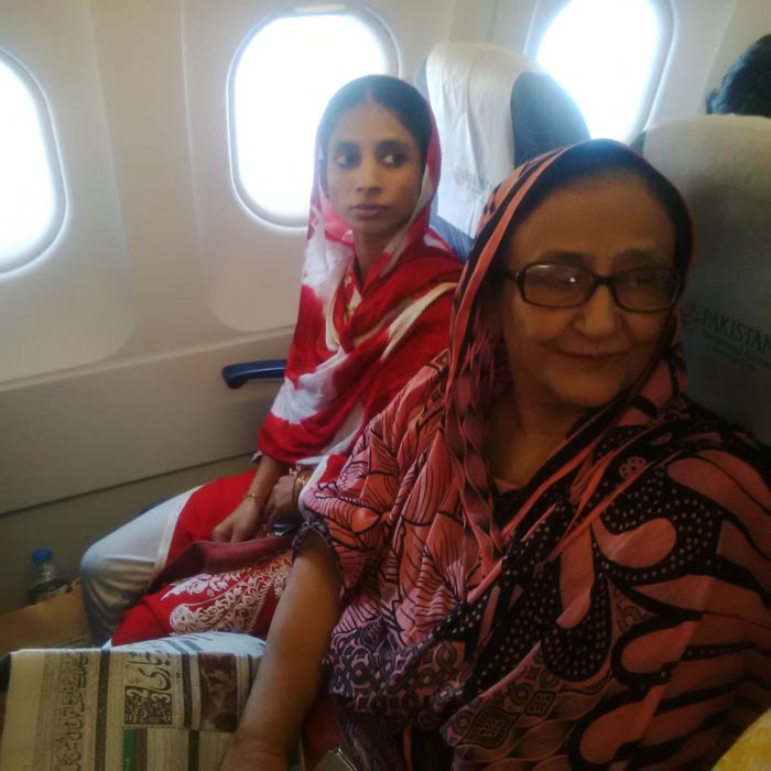 Geeta on the flight with Bilquees Edhi of Edhi Foundation who had adopted her in Karachi.