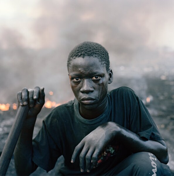 Abdulai Yahaya, 14. Many boys are sent to mine the dumps by families from the north. (Photo credit: Pieter Hugo for The New York Times)