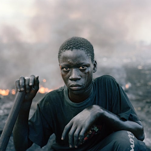 Seen in this picture, 14-year-old Abdulai Yahaya.<br> Many boys are sent to mine the dumps by families from the north. (NYT Photo)