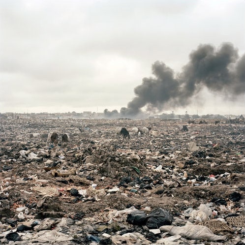 In 2008, Greenpeace sampled the burned soil at Agbogbloshie and found high levels of lead, cadmium, antimony, PCBs and chlorinated dioxins. (NYT Photo)