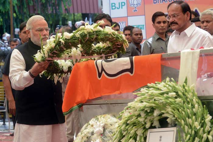 Prime Minister Narendra Modi paying respects to Gopinath Munde in New Delhi.