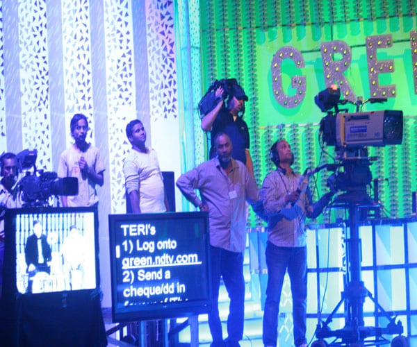 The camera persons making the right adjustments to make the environment look green enough!
